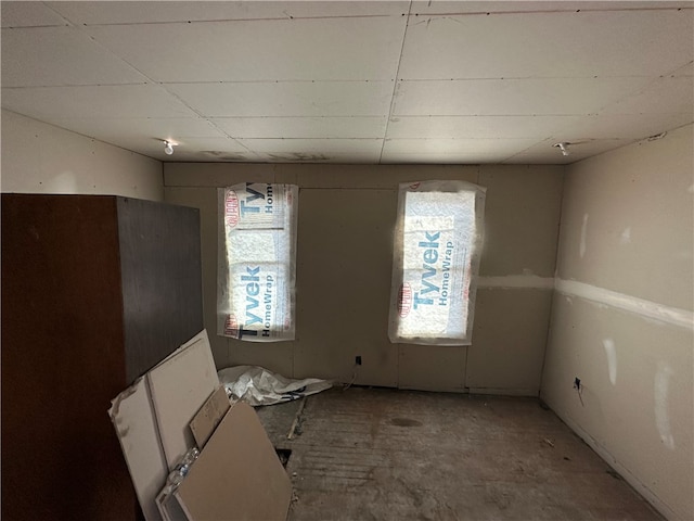 miscellaneous room with a wealth of natural light and a paneled ceiling