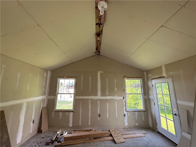 misc room featuring plenty of natural light and lofted ceiling