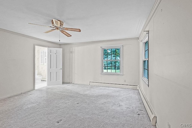 unfurnished room featuring a baseboard heating unit, crown molding, light colored carpet, and ceiling fan