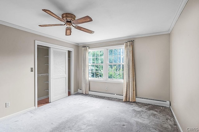 spare room with crown molding, ceiling fan, and carpet