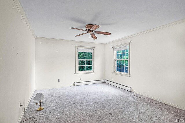 spare room with baseboard heating, ceiling fan, carpet, and ornamental molding