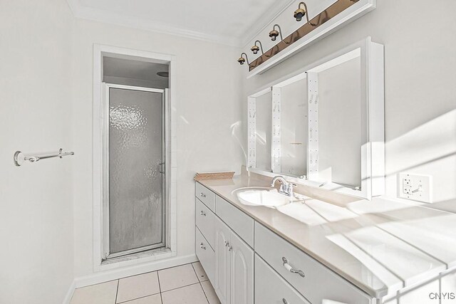 bathroom with tile patterned floors, walk in shower, vanity, and ornamental molding