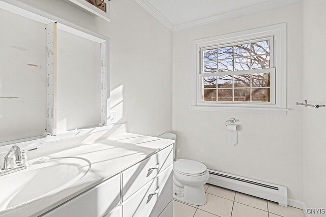 bathroom featuring vanity, tile patterned floors, crown molding, toilet, and baseboard heating