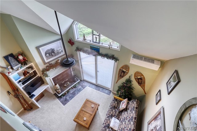 carpeted living room featuring lofted ceiling