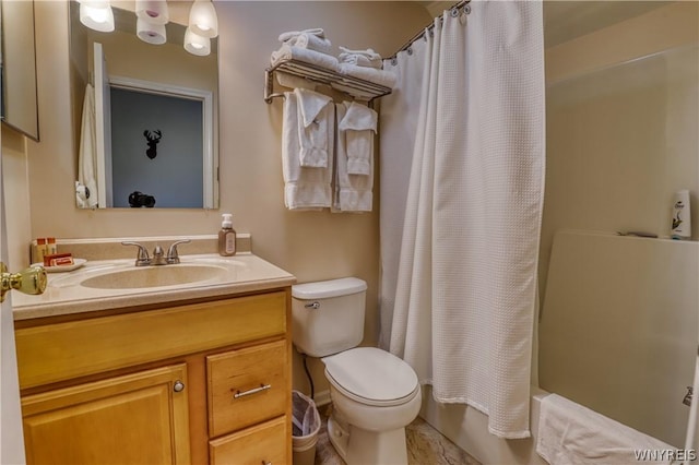 full bathroom with vanity, toilet, and shower / tub combo