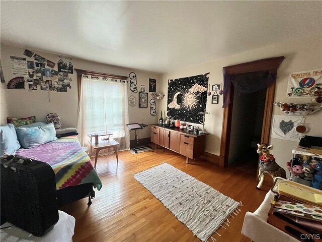 bedroom with light hardwood / wood-style floors