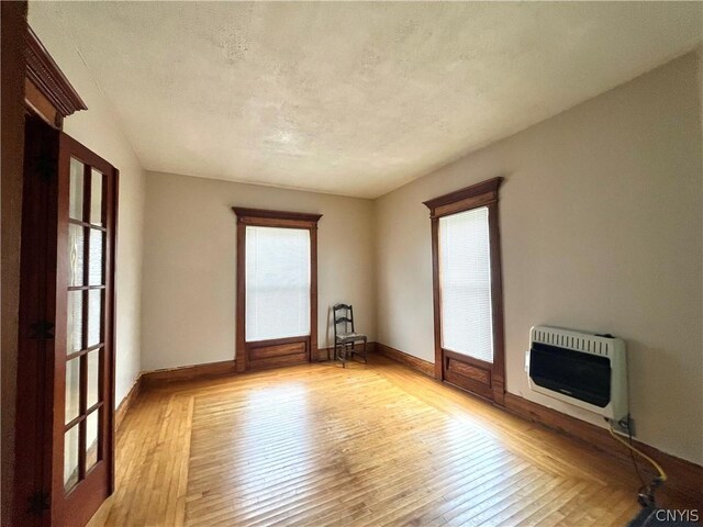 unfurnished room featuring light hardwood / wood-style flooring