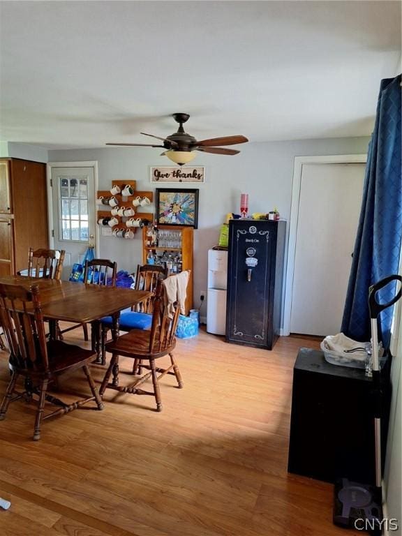 dining room featuring hardwood / wood-style flooring and ceiling fan