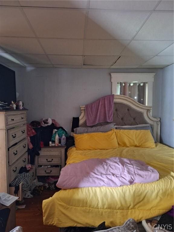 bedroom featuring a drop ceiling