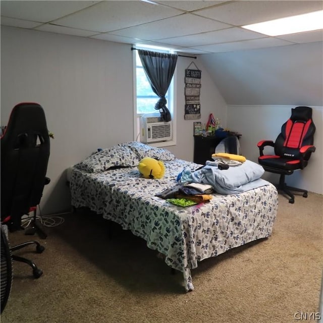 bedroom featuring a drop ceiling, cooling unit, carpet floors, and vaulted ceiling