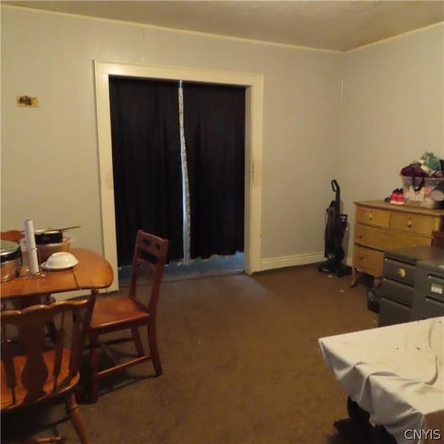 view of carpeted dining space