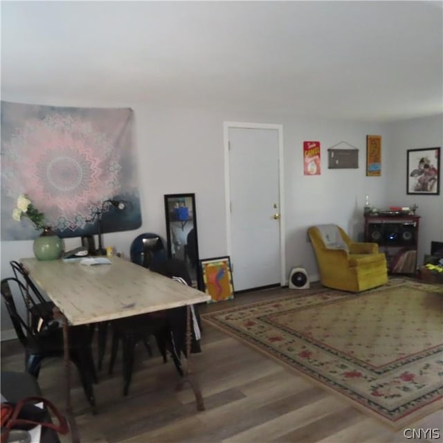 dining area featuring hardwood / wood-style floors