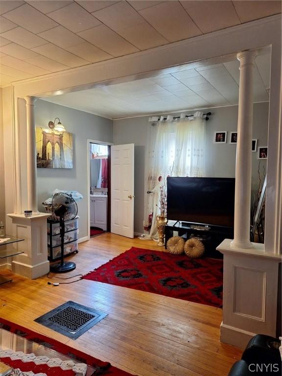 living room with light hardwood / wood-style flooring