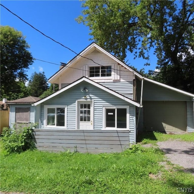 view of side of home with a garage