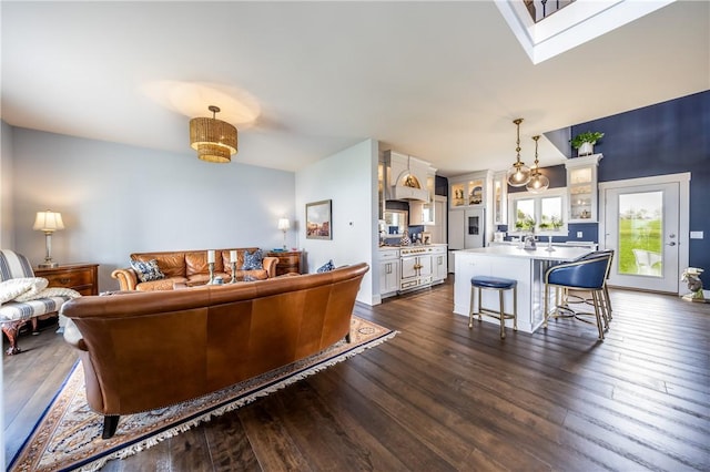 living room with dark hardwood / wood-style floors