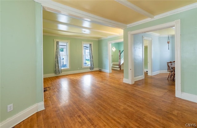 unfurnished room featuring light hardwood / wood-style flooring and ornamental molding