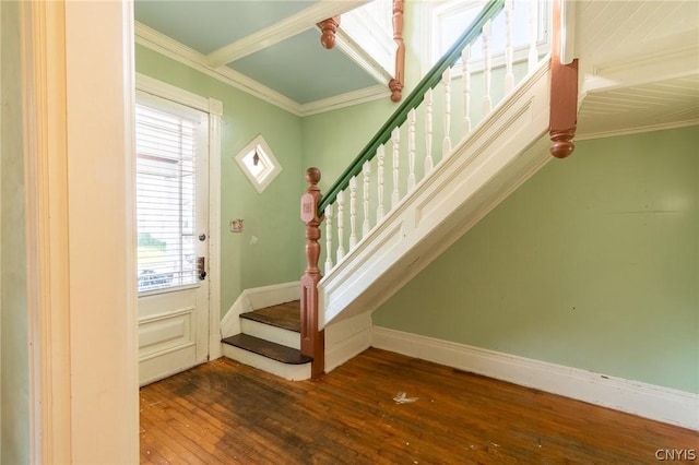 entryway featuring dark hardwood / wood-style floors and ornamental molding