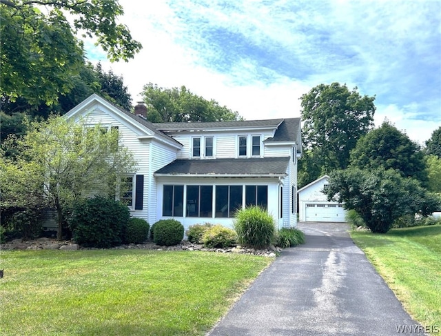 front facade with a front lawn