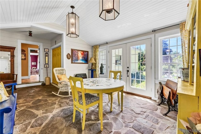 interior space featuring vaulted ceiling, wooden ceiling, and french doors