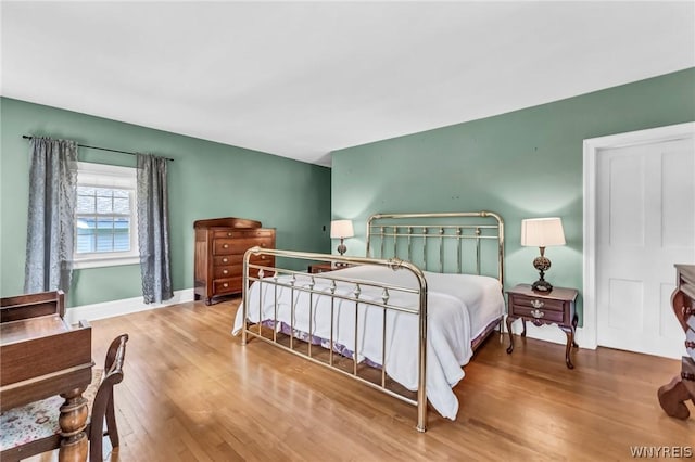 bedroom featuring hardwood / wood-style flooring