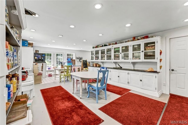 kitchen featuring white cabinets