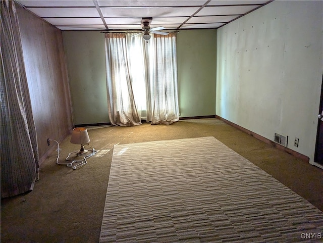 spare room with carpet and ceiling fan