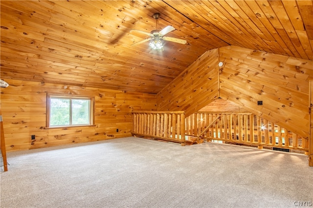 bonus room with carpet floors, wooden ceiling, ceiling fan, and vaulted ceiling