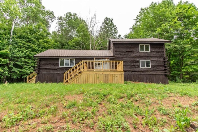 14141 Melanie Ln, Diana, NY 13648 - back of house with stairs, a wooden deck, metal roof, and log siding