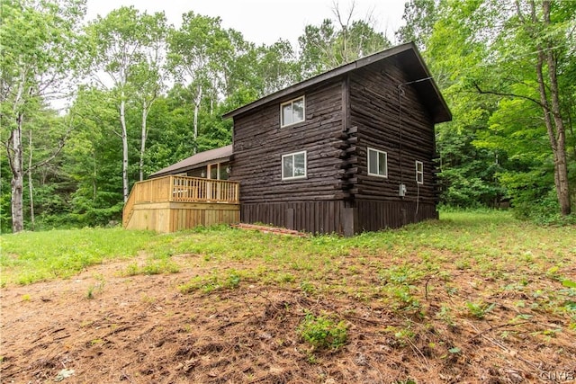 14141 Melanie Ln, Diana, NY 13648 - view of property exterior with log exterior and a deck