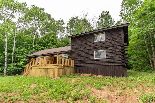 14141 Melanie Ln, Diana, NY 13648 - view of side of property featuring a wooden deck, log exterior, and stairway