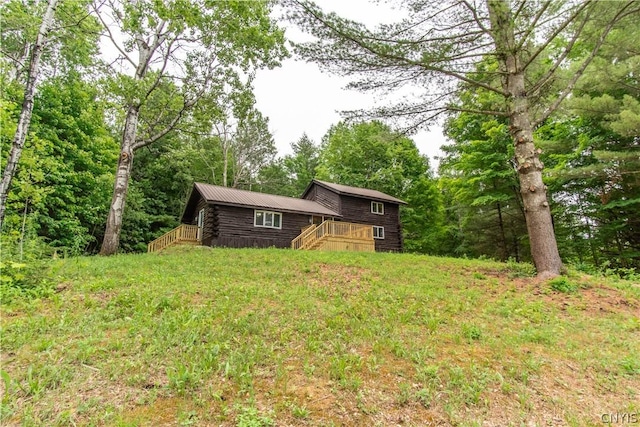 14141 Melanie Ln, Diana, NY 13648 - view of yard featuring stairway and a deck