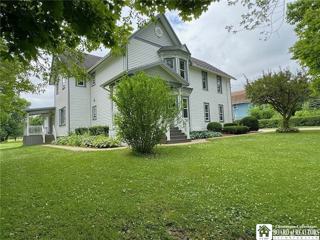 exterior space featuring a lawn