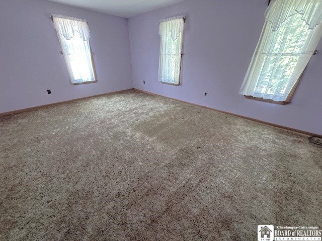 view of carpeted spare room