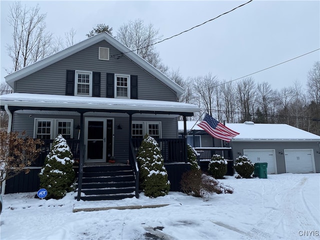 view of front of property featuring a porch and a garage