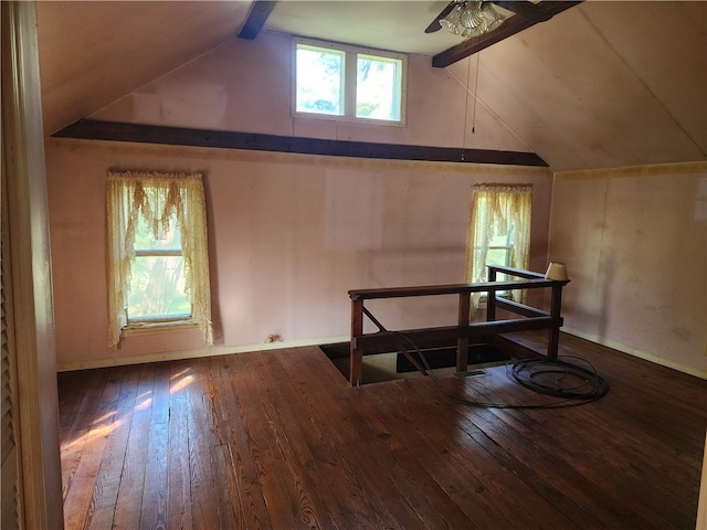 bonus room with ceiling fan, hardwood / wood-style floors, and lofted ceiling with beams