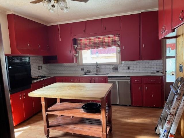 kitchen featuring red cabinetry