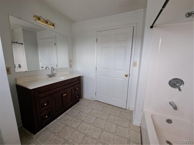 bathroom featuring vanity and bathtub / shower combination