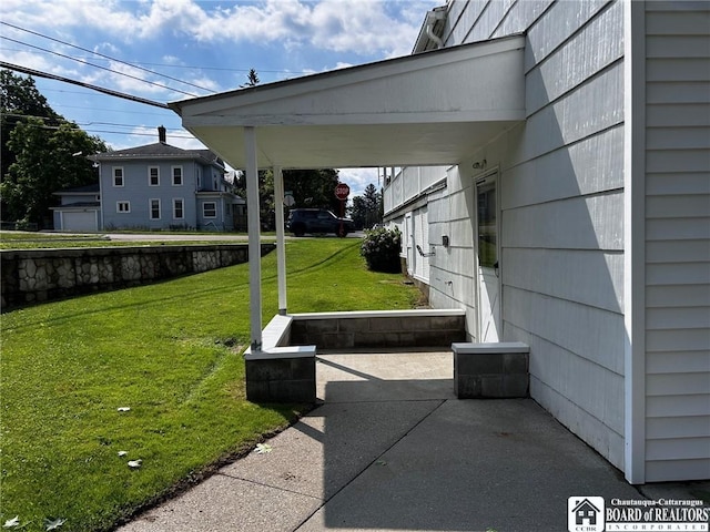 view of patio / terrace with a carport