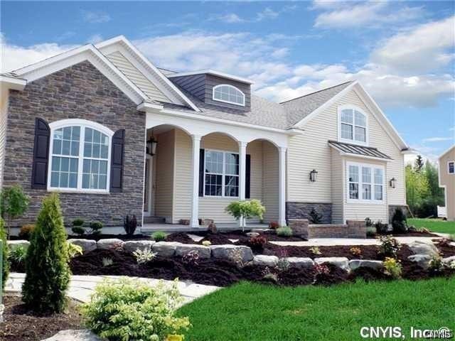 view of front of home with a front lawn