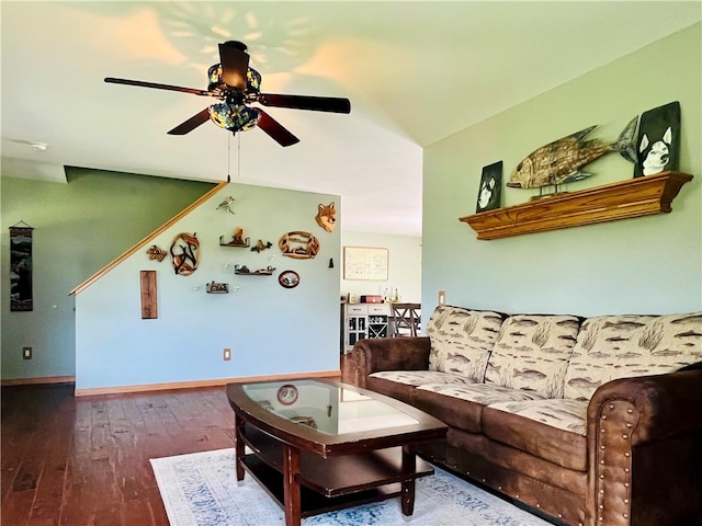 living room with ceiling fan and hardwood / wood-style floors