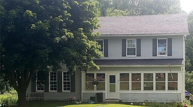 view of front of home with a front lawn