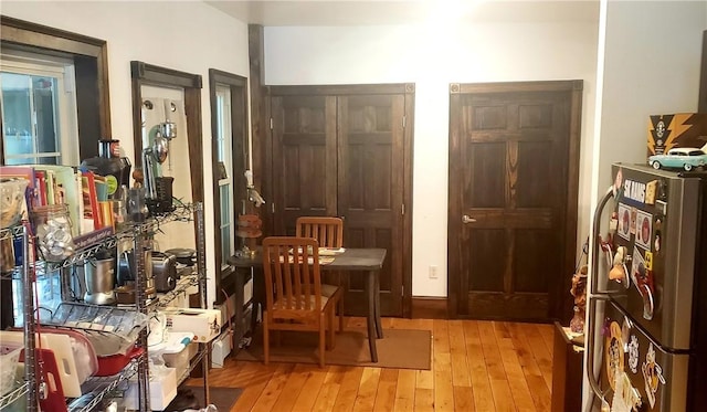 sitting room featuring light hardwood / wood-style floors