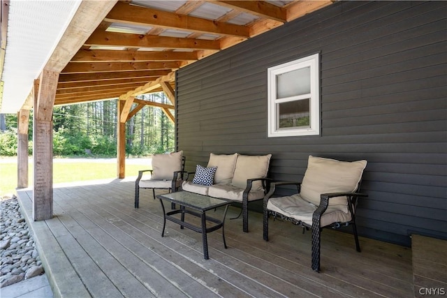 wooden deck with outdoor lounge area