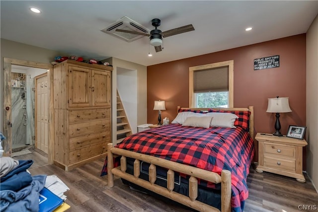 bedroom with dark wood-type flooring and ceiling fan