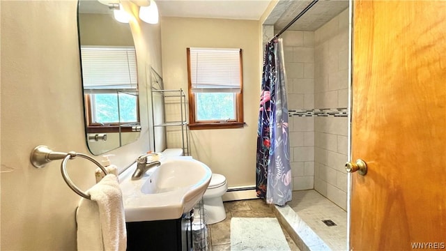 bathroom featuring vanity, curtained shower, toilet, and a baseboard radiator