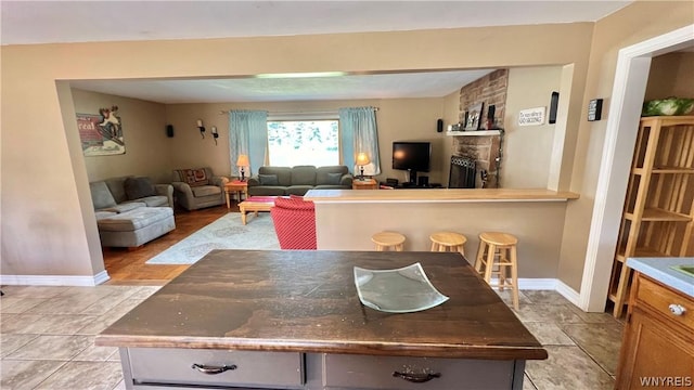 kitchen with a fireplace