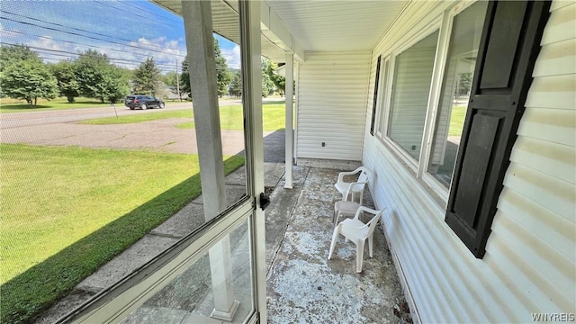 view of patio featuring a porch