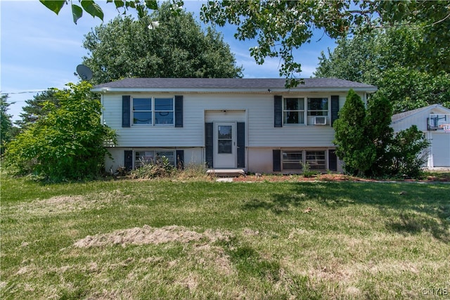 bi-level home with a front yard