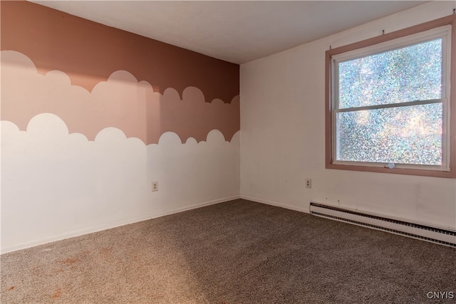 empty room with carpet and baseboard heating