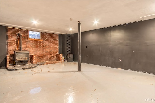 basement featuring a wood stove